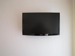 TV a/nebo společenská místnost v ubytování Hotel Scaranò