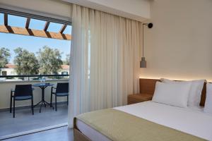 Postel nebo postele na pokoji v ubytování SENTIDO Apollo Palace