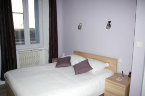 Un ou plusieurs lits dans un hébergement de l'établissement Queen Serenity Hotel