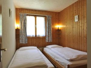 Postel nebo postele na pokoji v ubytování Chalet Mountain View by Interhome