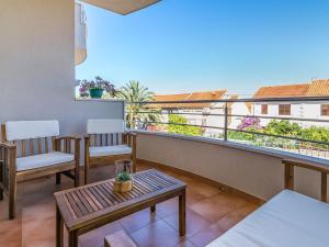 Balkón nebo terasa v ubytování Apartment Villa 2 Pools-1 by Interhome