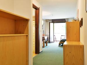 a room with a hallway with a door to a room at Apartment Enrosadira-5 by Interhome in Alba di Canazei