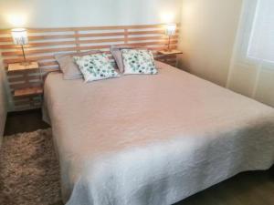 Postel nebo postele na pokoji v ubytování Holiday Home Pariisinranta by Interhome