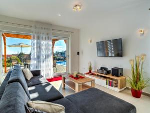 TV a/nebo společenská místnost v ubytování Holiday Home Races by Interhome