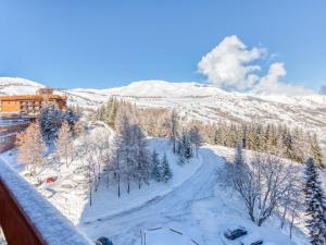 an aerial view of a snow covered mountain at Apartment Soyouz Vanguard-80 by Interhome in Le Corbier