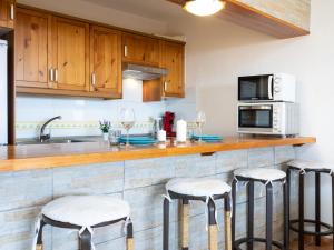 Kuchyň nebo kuchyňský kout v ubytování Apartment Cozy Neptuno by Interhome