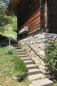 a stone stairway leading to a building at Apartment Stubulti by Interhome in Mörel