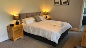 A bed or beds in a room at No.42 Kegworth House 