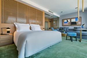 Postel nebo postele na pokoji v ubytování Adriana Hvar Spa Hotel