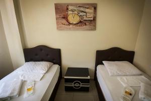 Postel nebo postele na pokoji v ubytování Otel 22 Edirne