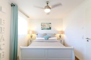 Postel nebo postele na pokoji v ubytování Ostseestrandliebe Villa Sanddorn Nr2
