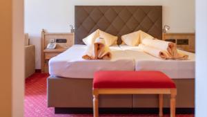 Łóżko lub łóżka w pokoju w obiekcie Hotel Dornauhof