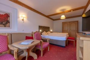 Łóżko lub łóżka w pokoju w obiekcie Hotel Dornauhof