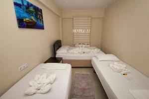Postel nebo postele na pokoji v ubytování Otel 22 Edirne