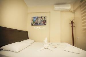 Postel nebo postele na pokoji v ubytování Otel 22 Edirne
