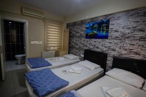 Postel nebo postele na pokoji v ubytování Otel 22 Edirne