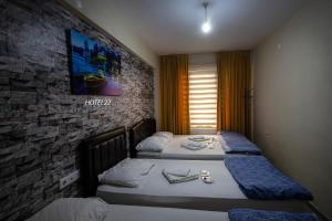 Postel nebo postele na pokoji v ubytování Otel 22 Edirne