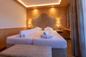 Łóżko lub łóżka w pokoju w obiekcie Hotel Dornauhof