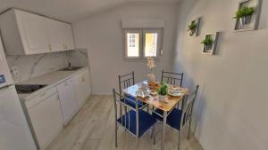 Kuchyňa alebo kuchynka v ubytovaní Apartments DaMa