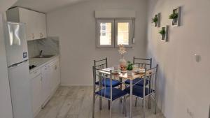 Kuchyňa alebo kuchynka v ubytovaní Apartments DaMa
