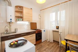 a kitchen with a sink and a counter top at Apartment on Soborniy 85 in Oleksandriya