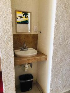 Koupelna v ubytování Bungalows La Perla Playa Azul