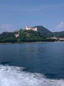 a view of a body of water from a boat at B&B La Rosa del Lago in Reno Di Leggiuno