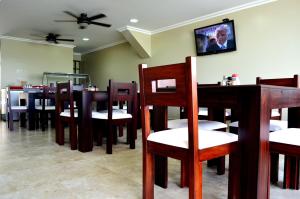 Restoran või mõni muu söögikoht majutusasutuses Hotel Marvento Suites