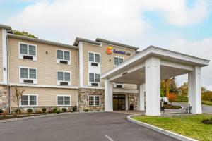 a rendering of a hotel with a building at Comfort Inn in Brewster