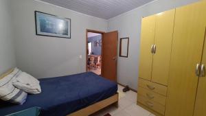 Tempat tidur dalam kamar di MARÉ - Paz e Sossego