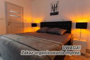 Tempat tidur dalam kamar di Aparthotel Zabrze, Apartamenty Centrum