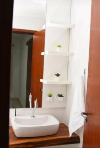 Ванна кімната в Raposo Vale Encantado Pousada