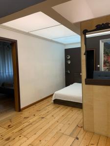 A bed or beds in a room at 21 Han Asparuh - 24h Self Check-in