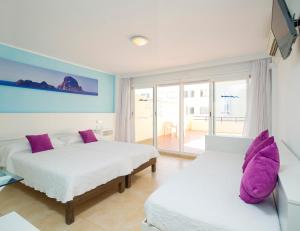 Postel nebo postele na pokoji v ubytování Hostal Costa Blanca