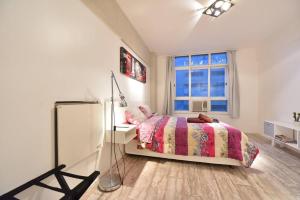 מיטה או מיטות בחדר ב-Studio Obelisco
