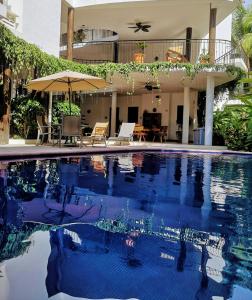 Bazén v ubytování Hotelito Los Sueños nebo v jeho okolí