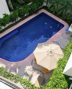 Bazén v ubytování Hotelito Los Sueños nebo v jeho okolí