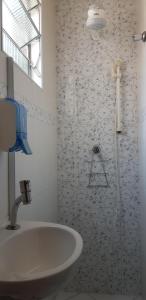 Ванная комната в HostelariaSP Boutique