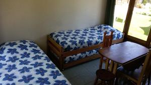 سرير أو أسرّة في غرفة في Lodging Quirinal