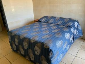 Postel nebo postele na pokoji v ubytování Top 1 Motel
