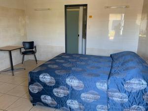 Postel nebo postele na pokoji v ubytování Top 1 Motel