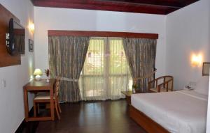 Una habitación en VascoDaGama Beach Resort