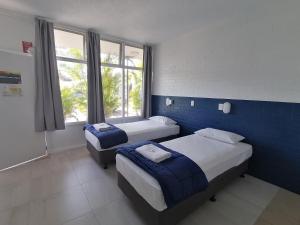 Postel nebo postele na pokoji v ubytování Hoey Moey Backpackers