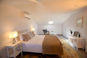 Ένα ή περισσότερα κρεβάτια σε δωμάτιο στο Truemar Hotels & Suites +48 φωτογραφίες