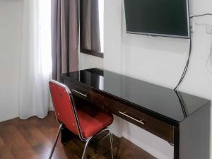 Televisyen dan/atau pusat hiburan di Avalon Karawaci Mitra RedDoorz