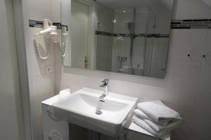 Koupelna v ubytování Hotel Gasthaus Krone