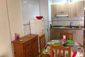 A kitchen or kitchenette at Plaza Charco - Top centro - Piscina Rooftop