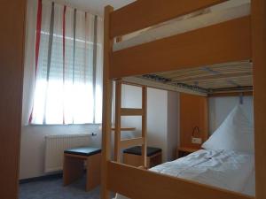 Postel nebo postele na pokoji v ubytování Hotel Gasthaus Krone