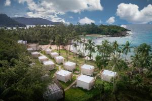 an aerial view of a resort near the ocean at Hideout Koh Kood in Ko Kood