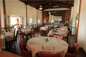 En restaurang eller annat matställe på Flat Hotel Fazenda Monte Castelo - Gravatá